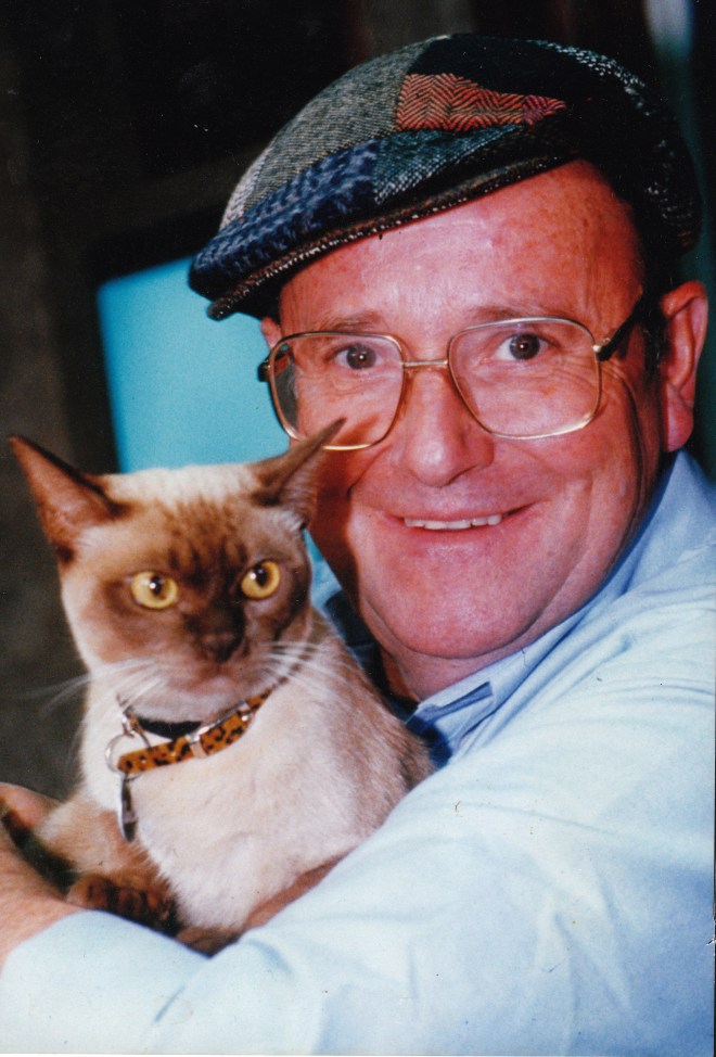 Australian TV celebrity vet Dr Harry with Babette. His verdict: "A lovely cat, but she won't be best in show".